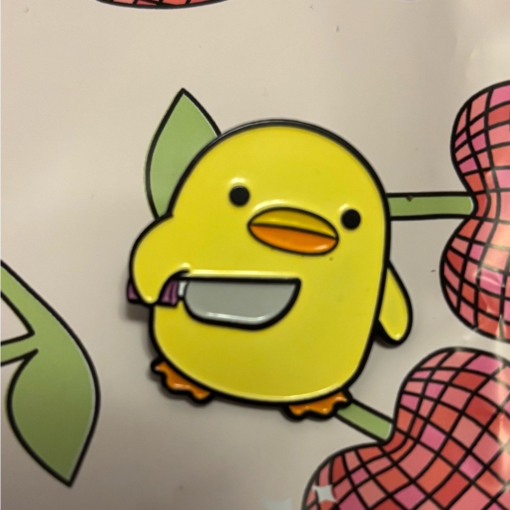 Duck with a Knife Enamel Pin